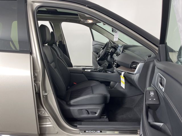 2025 Champagne Silver Metallic/Super Black Nissan Rogue Platinum FWD SUV