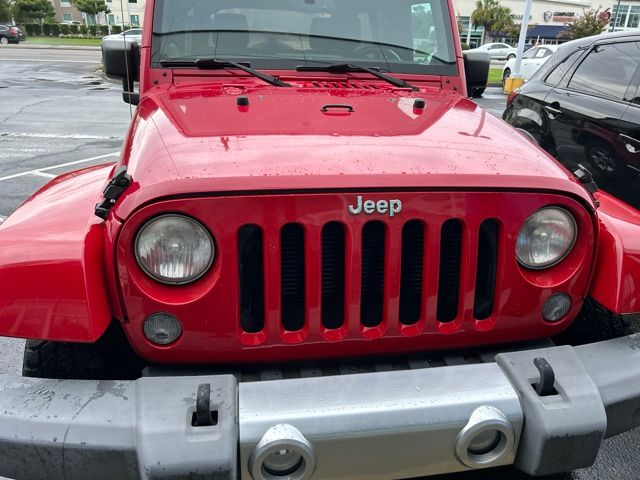 Used 2014 Red Jeep Unlimited Sahara image 8