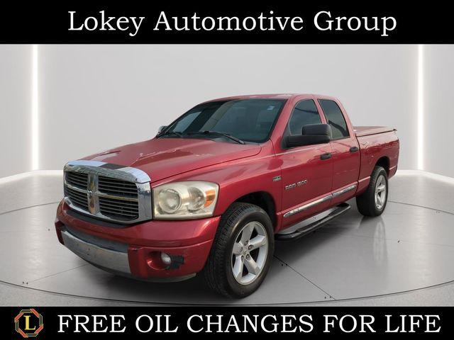 Inferno Red Crystal Pearlcoat 2007 Dodge RAM 1500 Laramie Quad Cab RWD Pickup Truck Rear-Wheel Drive 5-Speed Automatic