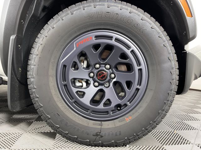 2025 Glacier White Nissan Frontier PRO-X RWD Truck