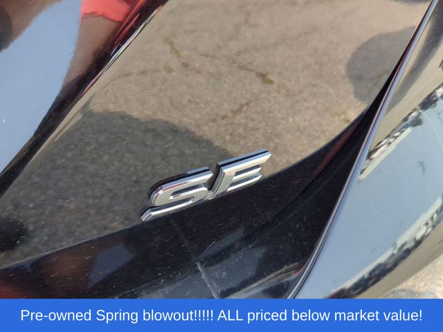 Used 2022 Midnight Black Metallic Toyota SE image 12