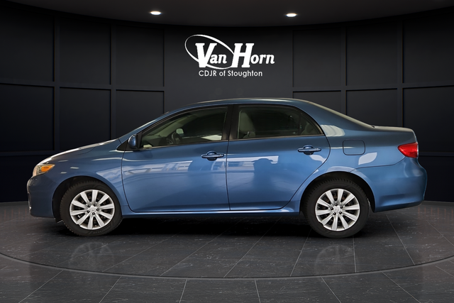 Used 2013 Tropical Sea Metallic Toyota LE image 4