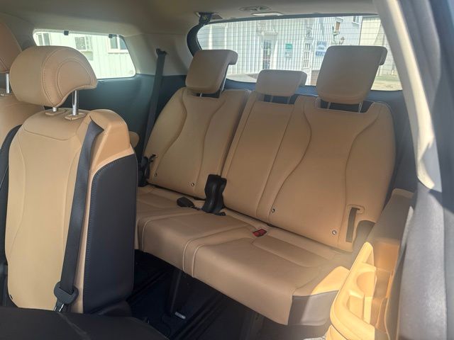 2024 Ceramic Silver Kia Carnival EX FWD Van