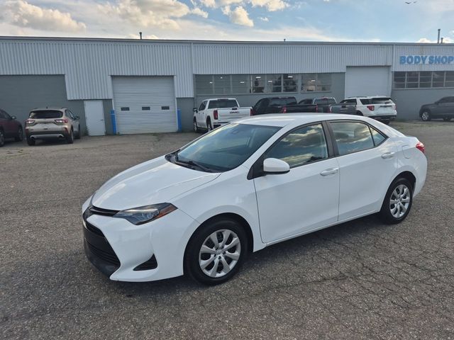 Super White 2019 Toyota Corolla Sedan Front-Wheel Drive Continuously Variable Transmission