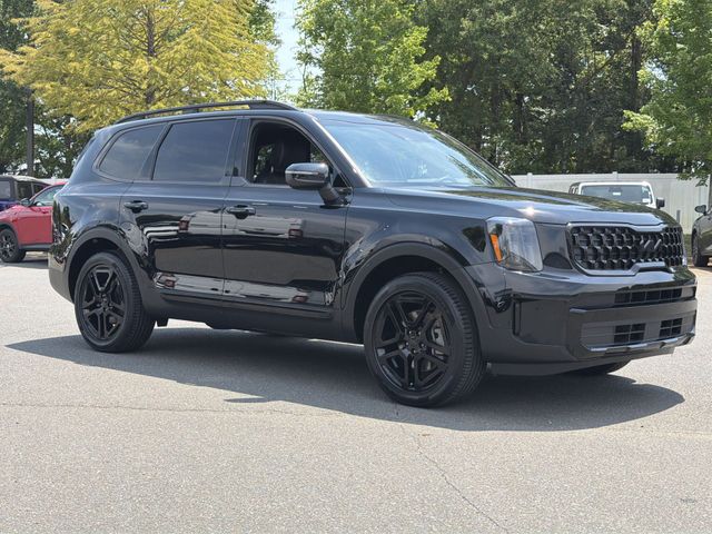 Used 2025 Black Kia EX X-Line image 14