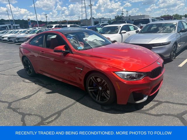 Orange Metallic 2015 BMW M4 Coupe Rear-Wheel Drive 6-Speed Manual