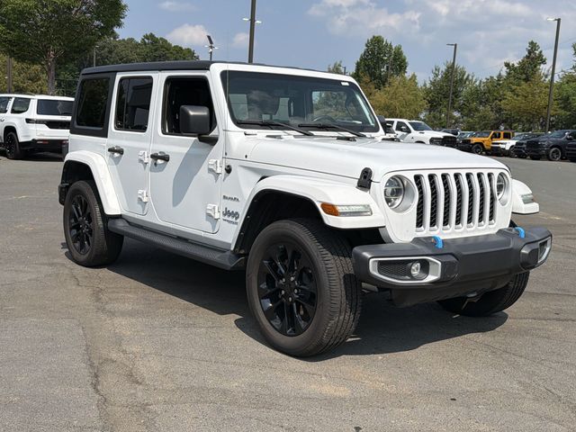 Used 2022 White Jeep Unlimited Sahara 4xe image 6