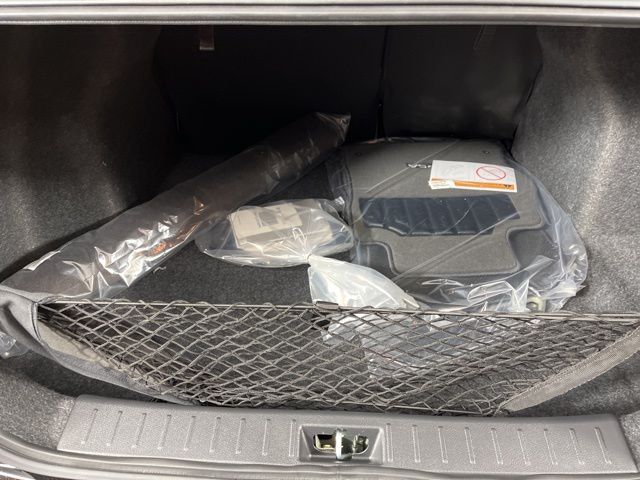 2025 Super Black Metallic Nissan Versa 1.6 SV FWD Sedan