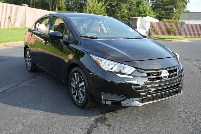 Super Black Metallic 2024 Nissan Versa Sedan Front-Wheel Drive Continuously Variable Transmission