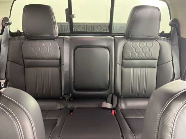 2025 Cardinal Red Metallic Tricoat Nissan Frontier SL RWD Truck