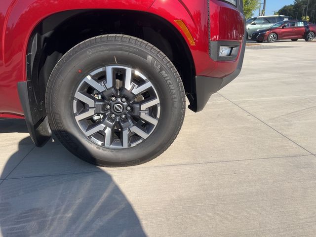 2025 Cardinal Red Metallic Tricoat Nissan Frontier SL RWD Truck