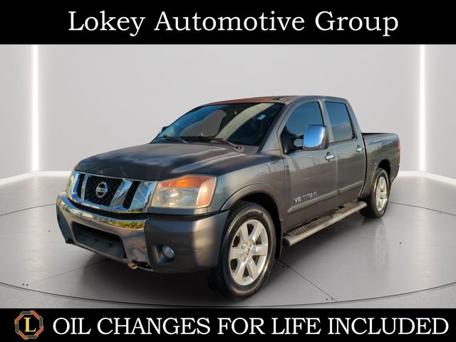 Silver (Smoke Metallic) 2010 Nissan Titan Pickup Truck 4X2 5-Speed Automatic