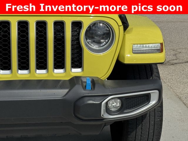 2023 Jeep Wrangler Sahara 4xe Yellow at DeMontrond Gulf Freeway