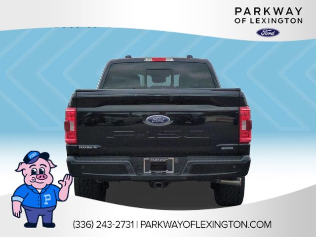 Used 2023 Agate Black Metallic Ford XLT image 4