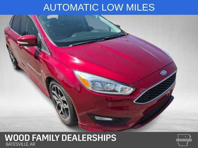 Ruby Red Metallic 2015 Ford Focus Sedan Front-Wheel Drive 6-Speed Automatic