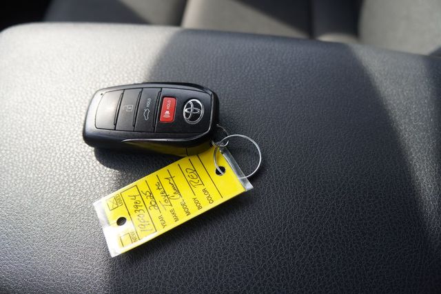 Certified Used 2025 Red Toyota LE image 2