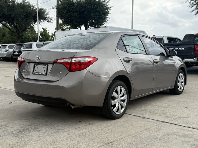2015 Toyota Corolla LE Brown at Texan Dodge Chrysler Jeep Ram