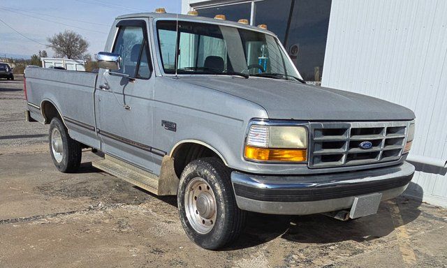 Gray 1995 Ford F-250 XL Standard Cab LB Pickup Truck Rear-Wheel Drive 4-Speed Automatic