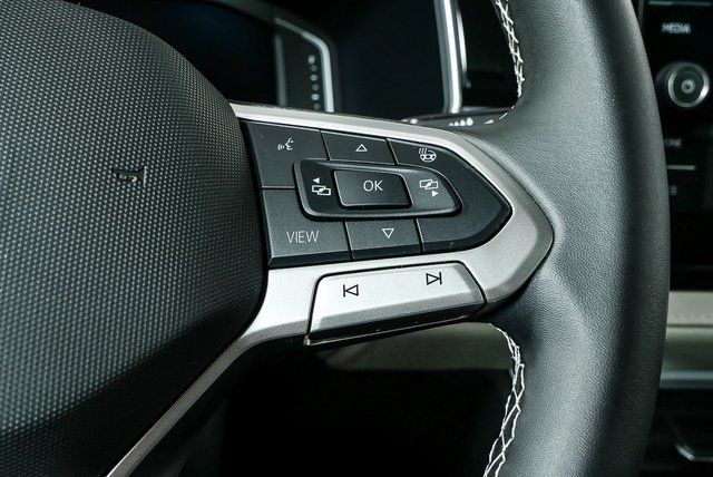 used 2025 Volkswagen Taos car, priced at $27,895