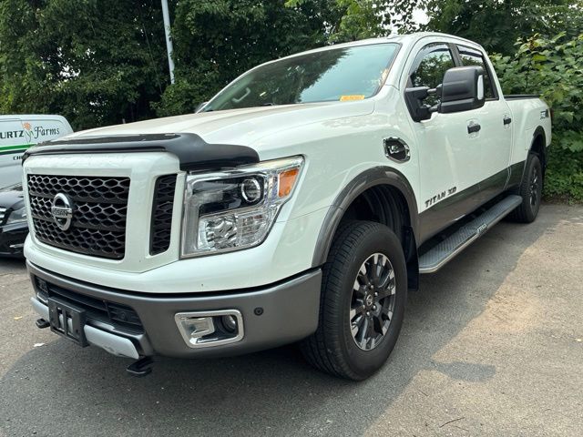 Pearl White 2019 Nissan Titan Pickup Truck Four-Wheel Drive 7-Speed Automatic