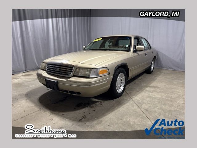 Brown (Tan) 2000 Ford Crown Victoria Sedan Rear-Wheel Drive 4-Speed Automatic Overdrive