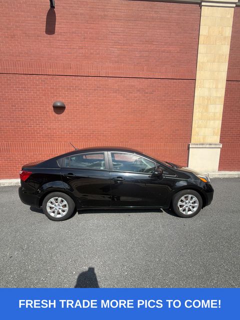 Aurora Black 2015 Kia Rio Sedan Front-Wheel Drive 6-Speed Automatic