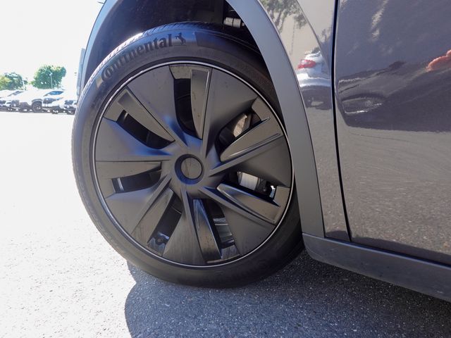 used 2025 Tesla Model Y car, priced at $40,735