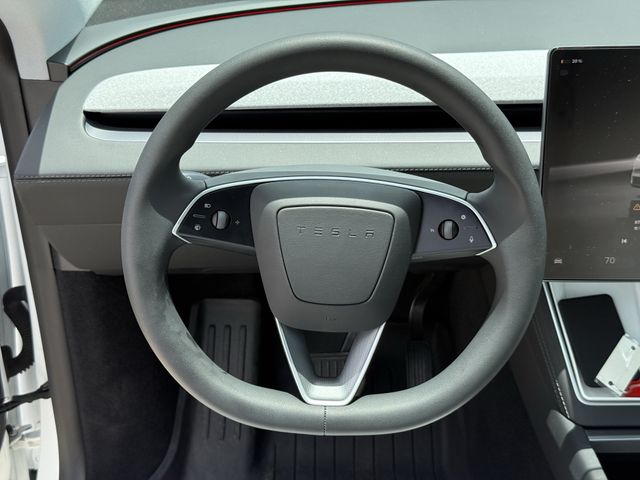 2026 Tesla Model Y Long Range White at AutoSavvy Houston Northwest