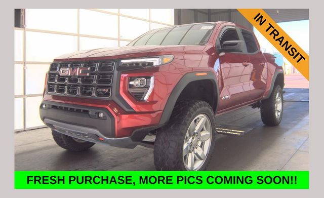 Volcanic Red Tintcoat 2025 GMC Canyon AT4 Crew Cab 4WD Pickup Truck Four-Wheel Drive 8-Speed Automatic
