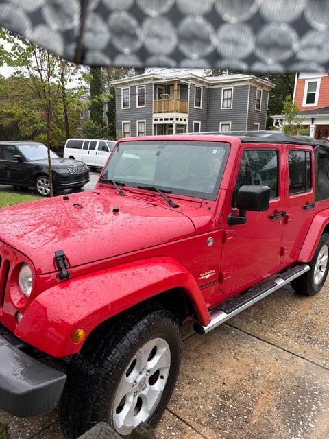 Used 2014 Red Jeep Unlimited Sahara image 30
