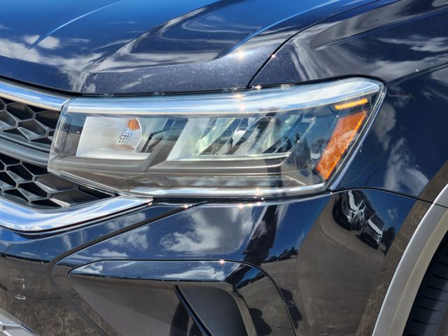 2023 Volkswagen Taos 1.5T SE Black at DeMontrond Auto Country