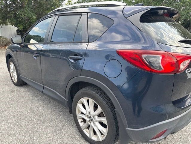 Used 2015 Mazda CX-5 Grand Touring with VIN JM3KE2DY9F0506657 for sale in DeLand, FL