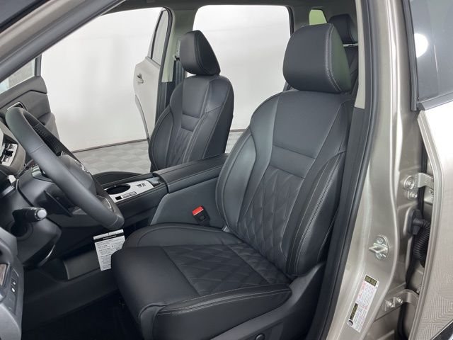 2025 Champagne Silver Metallic/Super Black Nissan Rogue Platinum FWD SUV
