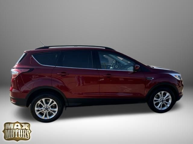 Used 2018 Ford Escape SE with VIN 1FMCU0GD9JUB09881 for sale in Kansas City