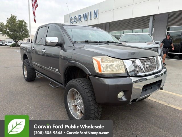 Silver (Smoke Metallic) 2008 Nissan Titan Pickup Truck Four-Wheel Drive 5-Speed Automatic