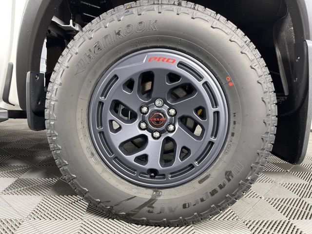 2025 Glacier White Nissan Frontier PRO-X RWD Truck
