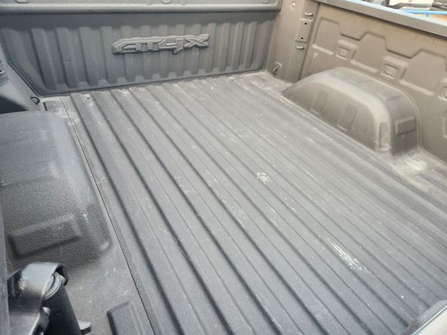 2024 GMC Sierra 1500 AT4X Silver at Classic Elite Chevrolet Sugar Land