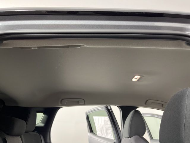 2025 Gun Metallic/Super Black Nissan Kicks SV FWD SUV