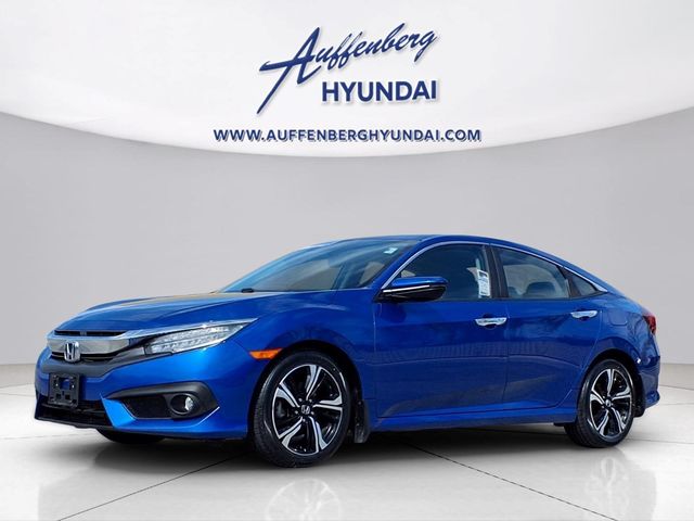 Blue 2016 Honda Civic Touring Sedan Front-Wheel Drive Continuously Variable Transmission
