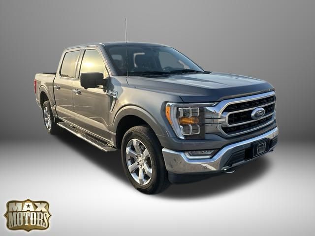 Used 2021 Ford F-150 XLT with VIN 1FTFW1E82MFC31319 for sale in Kansas City