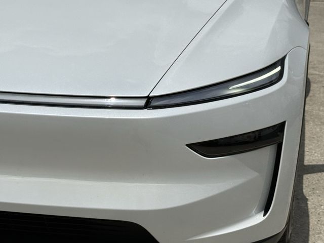 2026 Tesla Model Y Long Range White at AutoSavvy Houston Northwest