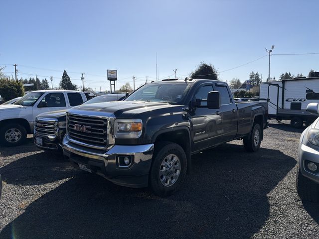 Gray (Iridium Metallic) 2015 GMC Sierra 3500HD SLE Double Cab 4WD Pickup Truck Four-Wheel Drive 6-Speed Automatic