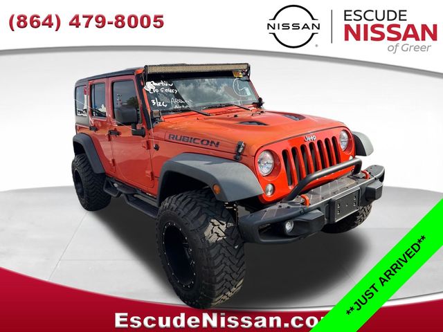 Sunset Orange Pearlcoat 2015 Jeep Wrangler Unlimited Rubicon 4WD SUV / Crossover Four-Wheel Drive 6-Speed Manual