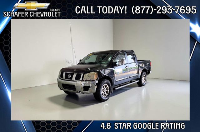 Gray 2004 Nissan Titan Pickup Truck Four-Wheel Drive 5-Speed Automatic Overdrive