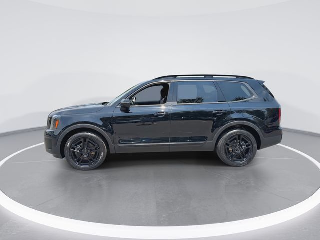 Used 2025 Black Kia EX X-Line image 5