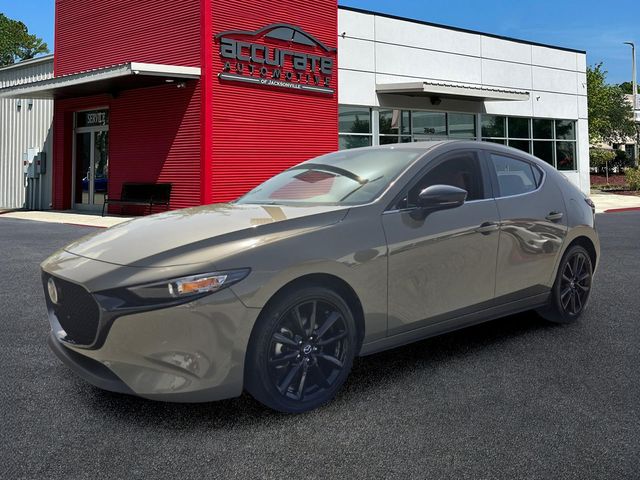 Zircon Sand Metallic 2024 Mazda MAZDA3 Hatchback All-Wheel Drive 6-Speed Automatic