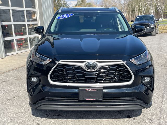 2023 Toyota Highlander XLE - Midnight Black Metallic exterior view 2