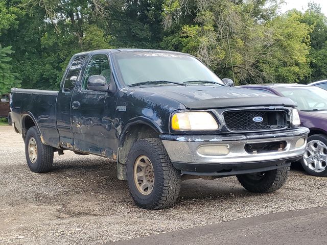Black Clearcoat 1997 Ford F-250 Pickup Truck Four-Wheel Drive 4-Speed Automatic