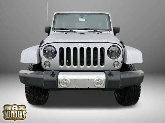 Used 2015 Jeep Wrangler Unlimited Sahara with VIN 1C4HJWEG3FL551345 for sale in Kansas City