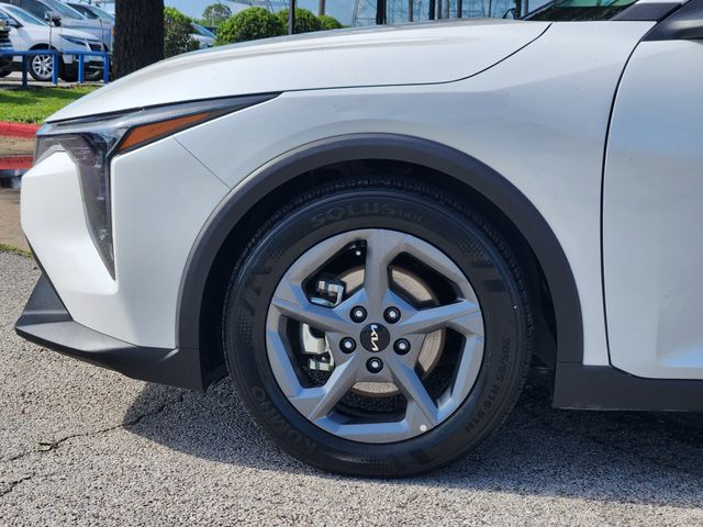2025 Kia K4 LXS White at Shottenkirk Kia Fort Bend